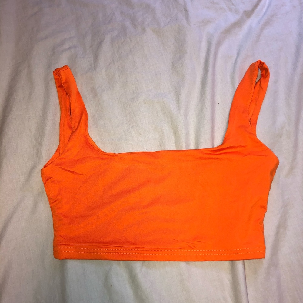 Bright orange top